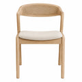 Silla de madera con respaldo de ratán y asiento de lino beige